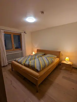 Ein Bett oder Betten in einem Zimmer der Unterkunft Ferienhaus Lengau