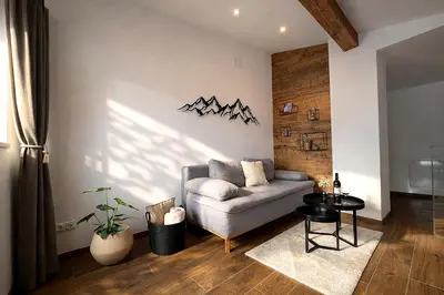 Ein Sitzbereich in der Unterkunft Bergzeit Appartment