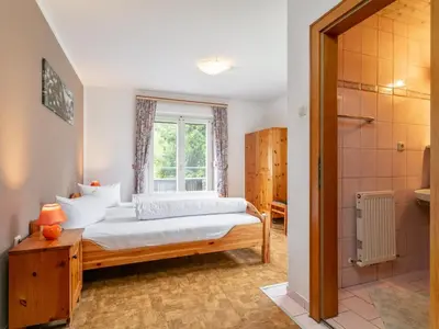 Ein Bett oder Betten in einem Zimmer der Unterkunft Wiesenglück