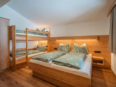 Ein Bett oder Betten in einem Zimmer der Unterkunft Glückauf
