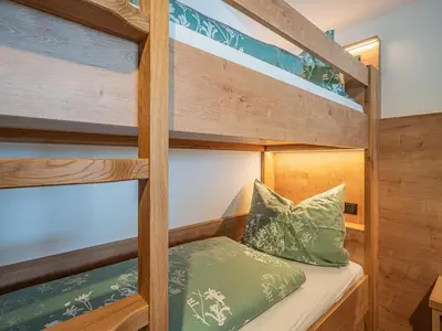 Ein Bett oder Betten in einem Zimmer der Unterkunft Glückauf