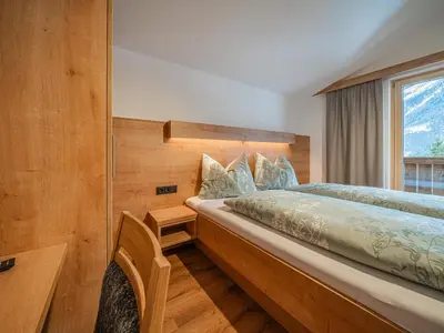 Ein Bett oder Betten in einem Zimmer der Unterkunft Glückauf