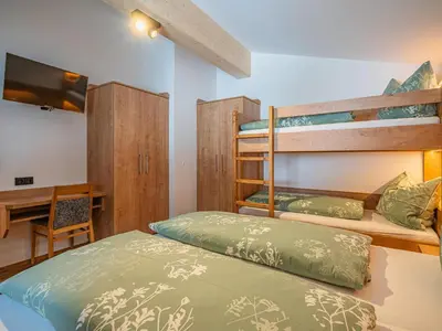 Ein Bett oder Betten in einem Zimmer der Unterkunft Glückauf
