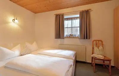 Ein Bett oder Betten in einem Zimmer der Unterkunft Haus Sonnenschein