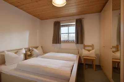Ein Bett oder Betten in einem Zimmer der Unterkunft Haus Sonnenschein