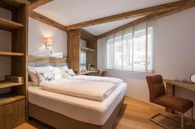Ein Bett oder Betten in einem Zimmer der Unterkunft Luxus Ferienwohnung Almhütte