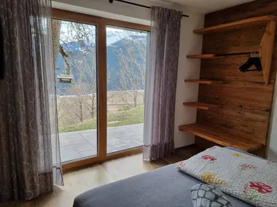Ein Bett oder Betten in einem Zimmer der Unterkunft Ferienwohnungen Zinzlerbauer