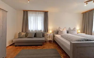 Ein Bett oder Betten in einem Zimmer der Unterkunft Ferienwohnungen Wies