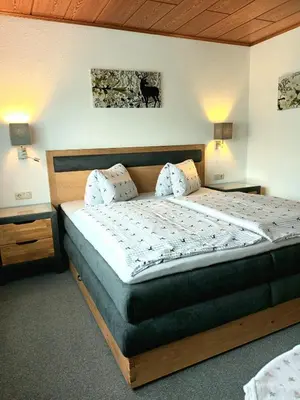 Ein Bett oder Betten in einem Zimmer der Unterkunft Ferienwohnung Zuppinger