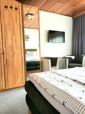 Ein Bett oder Betten in einem Zimmer der Unterkunft Ferienwohnung Zuppinger