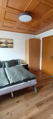 Ein Bett oder Betten in einem Zimmer der Unterkunft Ferienwohnung Zuppinger