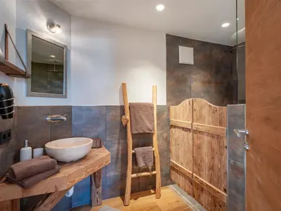 Ein Badezimmer in der Unterkunft Tirol Chalet Brixen