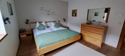 Ein Bett oder Betten in einem Zimmer der Unterkunft Ferienwohnung Fichtler