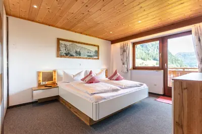 Ein Bett oder Betten in einem Zimmer der Unterkunft Mittermooshof