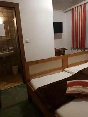 Ein Bett oder Betten in einem Zimmer der Unterkunft Haus Bergland