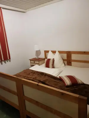 Ein Bett oder Betten in einem Zimmer der Unterkunft Haus Bergland