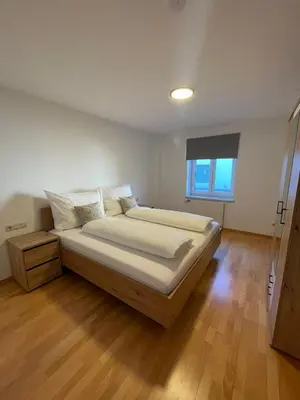 Ein Bett oder Betten in einem Zimmer der Unterkunft Haus Bergland