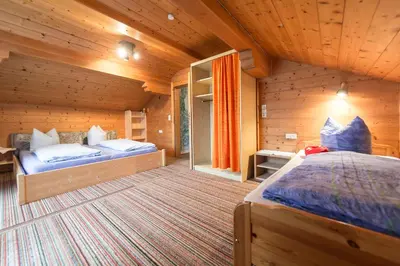 Ein Bett oder Betten in einem Zimmer der Unterkunft Ferienwohnungen Jutta