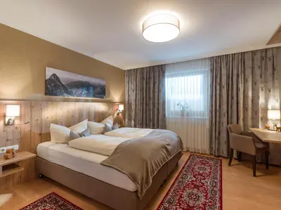 Ein Bett oder Betten in einem Zimmer der Unterkunft Ferienwohnung Biechl