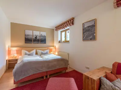 Ein Bett oder Betten in einem Zimmer der Unterkunft Ferienwohnung Biechl