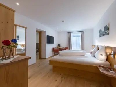 Ein Bett oder Betten in einem Zimmer der Unterkunft Postgasthof Fischerwirt