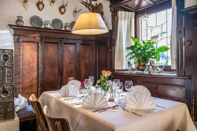 Ein Restaurant oder anderes Speiselokal in der Unterkunft Postgasthof Fischerwirt