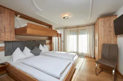 Ein Bett oder Betten in einem Zimmer der Unterkunft Landhaus Zirmhof