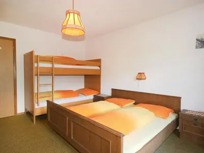 Ein Bett oder Betten in einem Zimmer der Unterkunft Apartment Dornauer-1 by Interhome