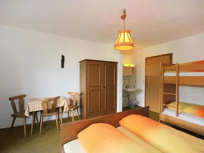 Ein Bett oder Betten in einem Zimmer der Unterkunft Apartment Dornauer-1 by Interhome