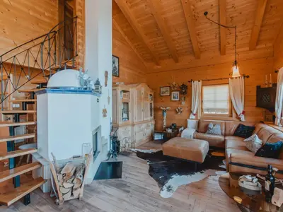 Ein Sitzbereich in der Unterkunft Chalet Königsleiten 3 by Interhome