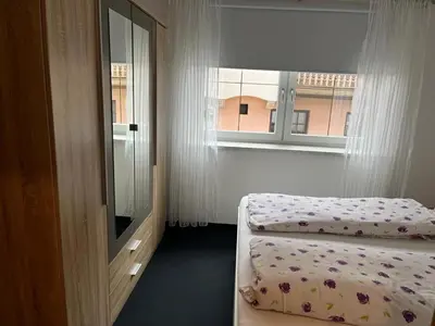 Ein Bett oder Betten in einem Zimmer der Unterkunft Ferienwohnung Gabriele