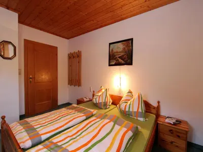 Ein Bett oder Betten in einem Zimmer der Unterkunft Apartment Sulzau near Wildkogel Ski Slopes