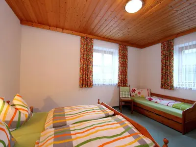 Ein Bett oder Betten in einem Zimmer der Unterkunft Apartment Sulzau near Wildkogel Ski Slopes