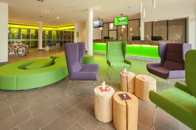 Ein Sitzbereich in der Unterkunft Explorer Hotel Kitzbühel