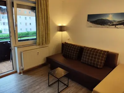 Ein Sitzbereich in der Unterkunft Ferienwohnung Loitfelder-Pang