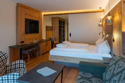 Ein Bett oder Betten in einem Zimmer der Unterkunft Hotel Jagdschlössl