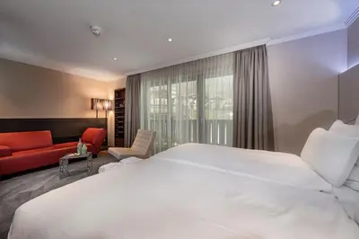 Ein Bett oder Betten in einem Zimmer der Unterkunft Alpinresort ValSaa - Adults Only