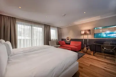 Ein Bett oder Betten in einem Zimmer der Unterkunft Alpinresort ValSaa - Adults Only