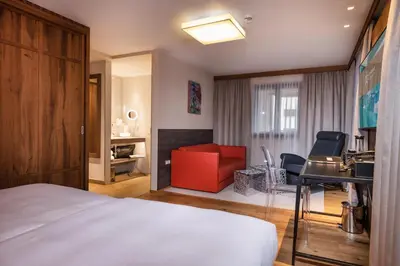 Ein Bett oder Betten in einem Zimmer der Unterkunft Alpinresort ValSaa - Adults Only