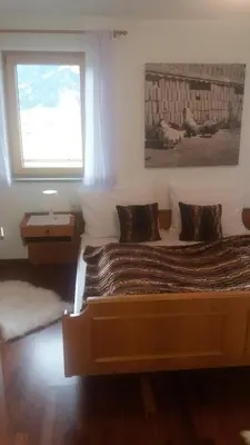 Ein Bett oder Betten in einem Zimmer der Unterkunft Böglerhof