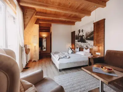 Ein Bett oder Betten in einem Zimmer der Unterkunft Boutique Hotel Haidachhof superior