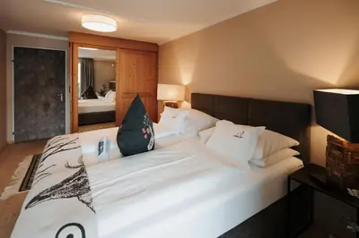 Ein Bett oder Betten in einem Zimmer der Unterkunft Boutique Hotel Haidachhof superior