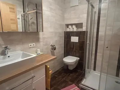 Ein Badezimmer in der Unterkunft Häringer Mühle