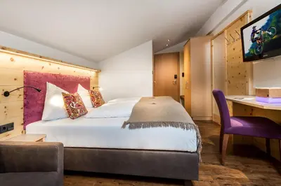 Ein Bett oder Betten in einem Zimmer der Unterkunft Hotel Talblick