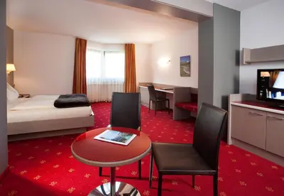 Ein Bett oder Betten in einem Zimmer der Unterkunft Hotel Bruno