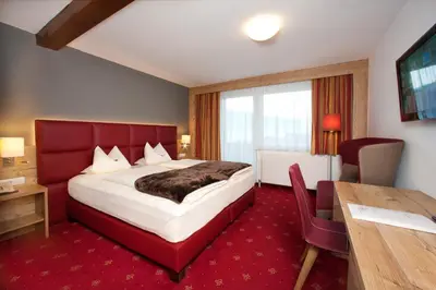 Ein Bett oder Betten in einem Zimmer der Unterkunft Hotel Bruno