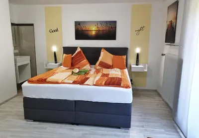 Ein Bett oder Betten in einem Zimmer der Unterkunft Ferienwohnung Mitterherzog
