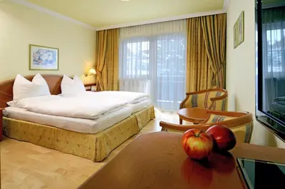 Ein Bett oder Betten in einem Zimmer der Unterkunft eva,GARDEN