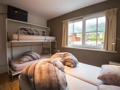 Ein Bett oder Betten in einem Zimmer der Unterkunft Modern apartment near the ski area