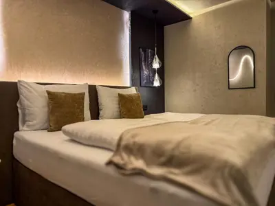 Ein Bett oder Betten in einem Zimmer der Unterkunft zum Senner Suites Zillertal